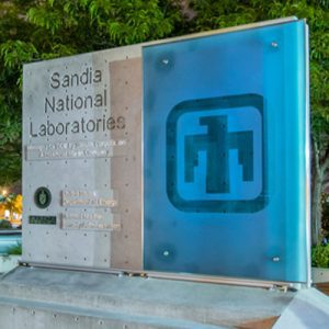 A monument sign for Sandia National Laboratories sits on the lab campus